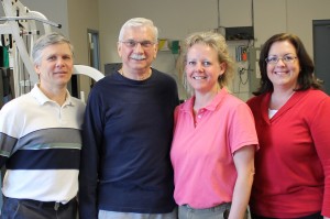 Staff and Patient at TheraSport Physical Therapy in Summerfield, North Carolina